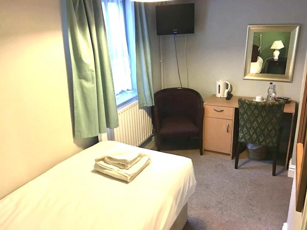 The Old Pheasant Hotel Glaston Kamer foto